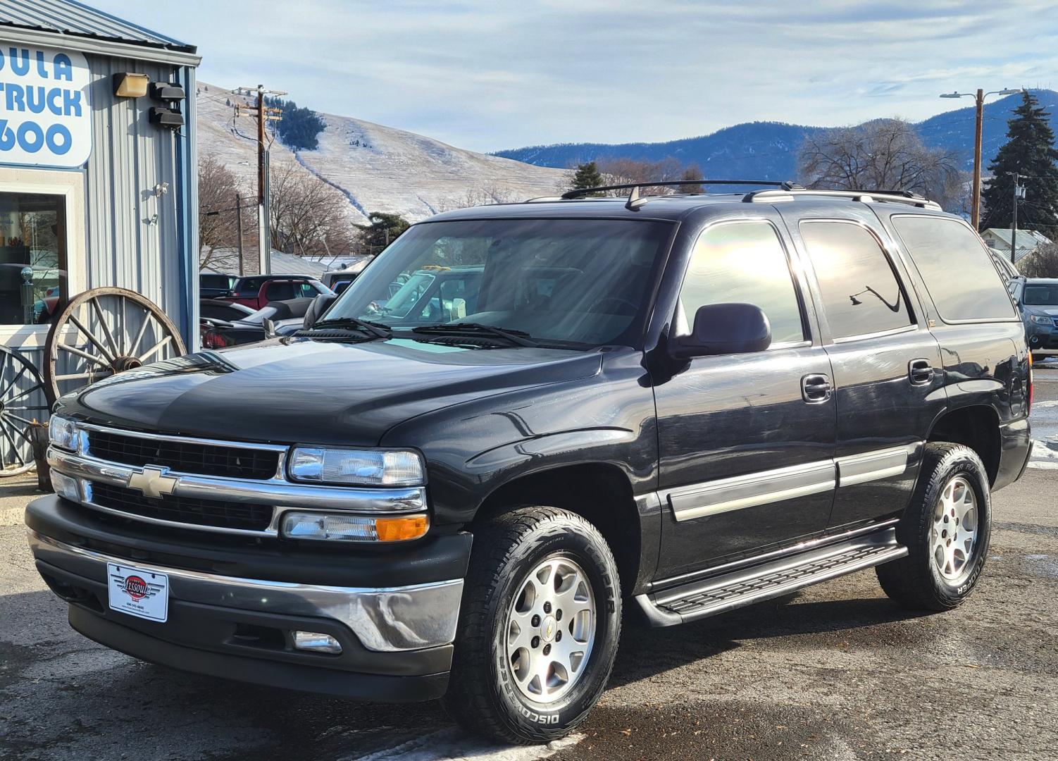 2006 Black /Tan Chevrolet Tahoe LT (1GNEK13Z76R) with an 5.3L V8 engine, Automatic transmission, located at 450 N Russell, Missoula, MT, 59801, (406) 543-6600, 46.874496, -114.017433 - Great Running Tahoe 4WD. 3rd Row Seat. Power Sunroof. Rear Entertainment. Power Heated Front Seats. Leather Seats. Front and Rear Climate Control. Running Boards. Cruise Control. Tilt. - Photo#1